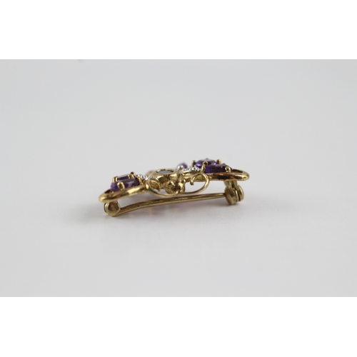 86 - 9ct gold amethyst and diamond butterfly brooch (2.9g)