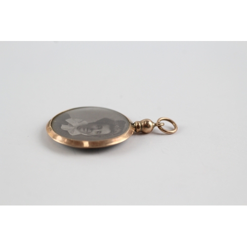 87 - 9ct gold photo locket pendant (1.9g)