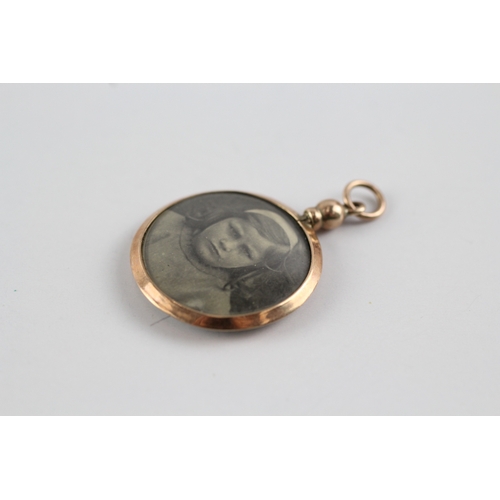 87 - 9ct gold photo locket pendant (1.9g)