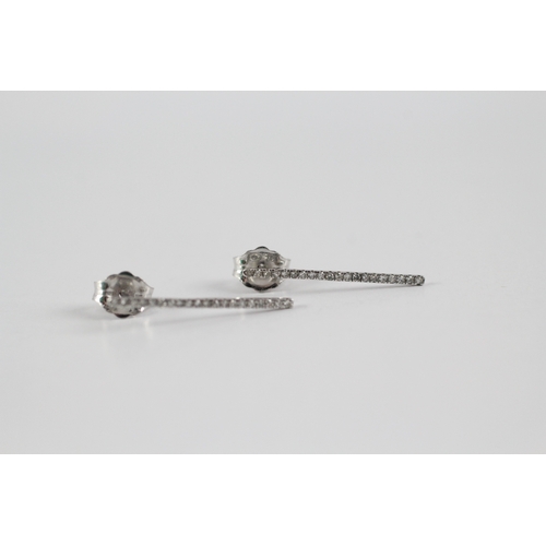 93 - 9ct white gold diamond row earrings (0.4g)