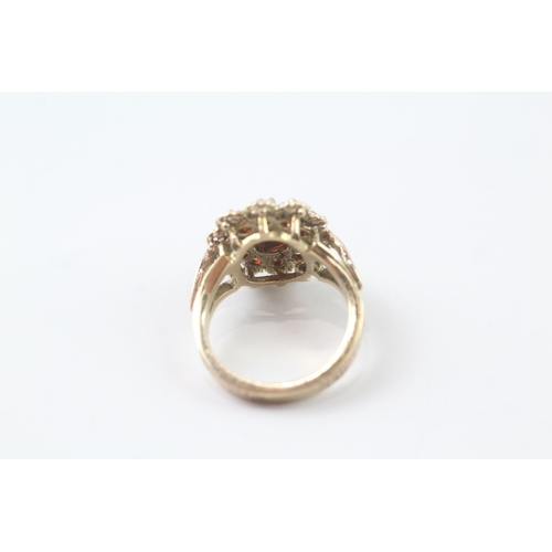 96 - 9ct gold garnet cluster cocktail ring (5.2g) Size K