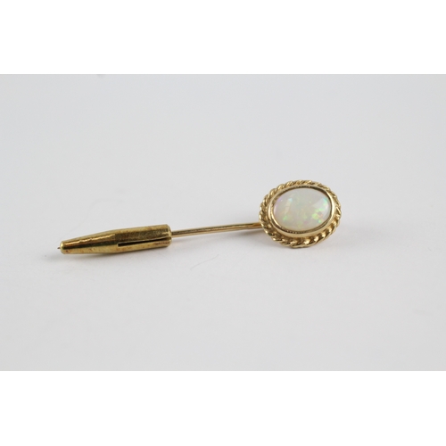 97 - 9ct gold opal stick pin (1.4g)