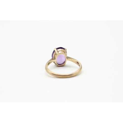 99 - 9ct gold and claw set amethyst ring (2.7g) Size N 1/2