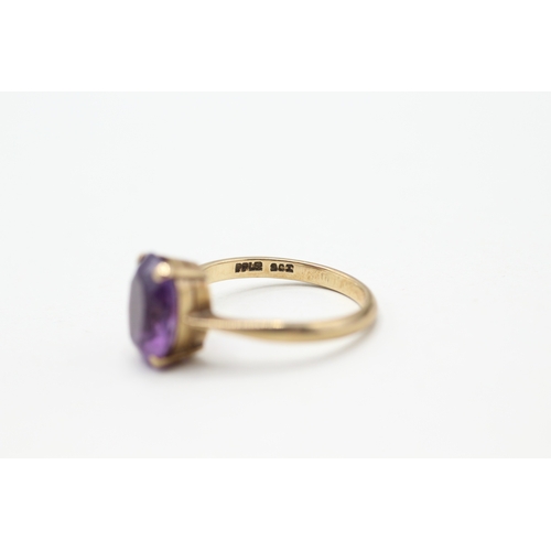 99 - 9ct gold and claw set amethyst ring (2.7g) Size N 1/2