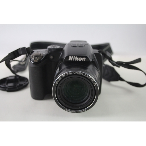 422 - Nikon Coolpix P100 Digital Bridge Camera Working w/ Nikkor 26x Wide Zoom Lens