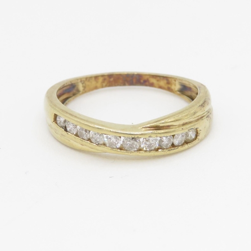 103 - 9ct gold diamond set eternity ring (1.9g) Size L