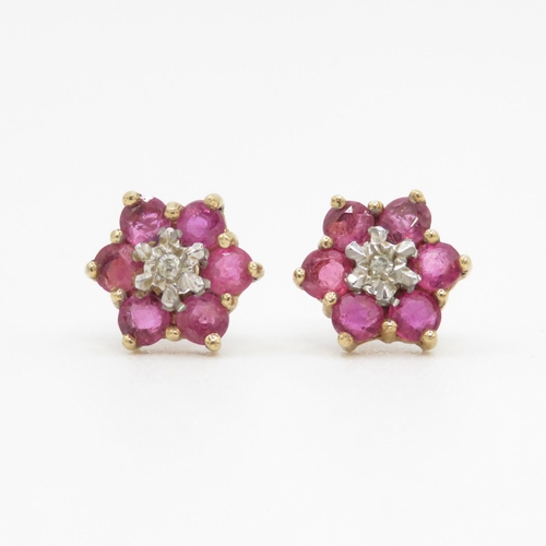 112 - 9ct gold diamond and ruby set floral cluster earrings (1.1g)