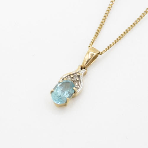 117 - 9ct gold diamond and blue gemstone set pendant necklace (1.7g)