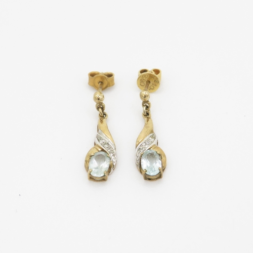 121 - 9ct gold diamond and blue topaz set drop earrings (2g)