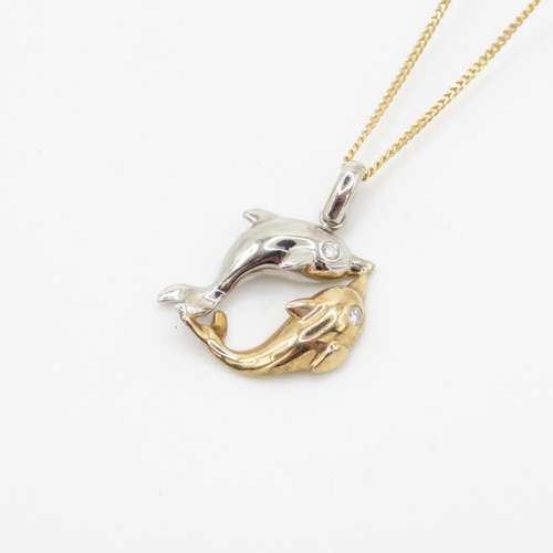 17 - 9ct white and yellow gold diamond set double dolphin pendant necklace (3.6g)