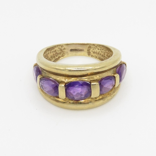 64 - 9ct gold and five stone amethyst ring (3.5g) Size K