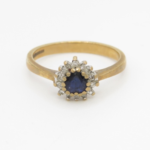 83 - 9ct gold diamond and heart cut sapphire set ring (2.6g) Size O