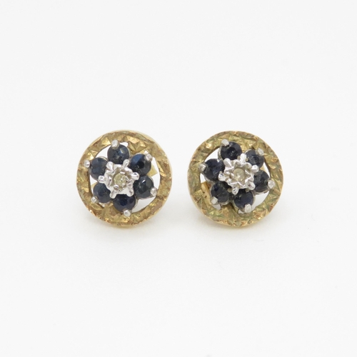 87 - 9ct gold sapphire and diamond flower stud earrings (1.9g)