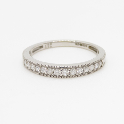 91 - 9ct white gold diamond set 14 stone eternity ring (1.8g) Size L