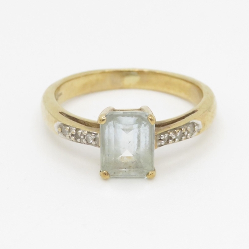 92 - 9ct gold diamond accented aquamarine set dress ring (3.4g) Size N 1/2