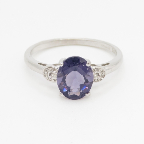 97 - 9ct white gold diamond and amethyst set dress ring (2.4g) Size T