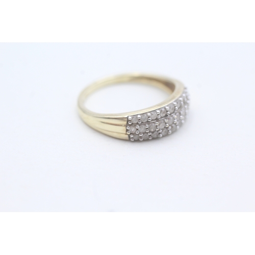 101 - 9ct gold diamond set band ring (2.3g) Size O