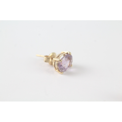 109 - 14ct gold amethyst stud earrings (1.7g)