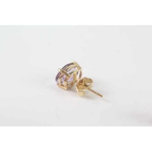 109 - 14ct gold amethyst stud earrings (1.7g)