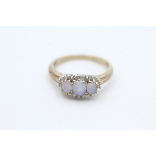 110 - 9ct gold diamond and opal set trilogy cluster ring (2.2g) Size N