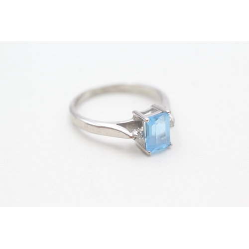 116 - 9ct white gold diamond and blue topaz dress ring (2.5g) Size M 1/2