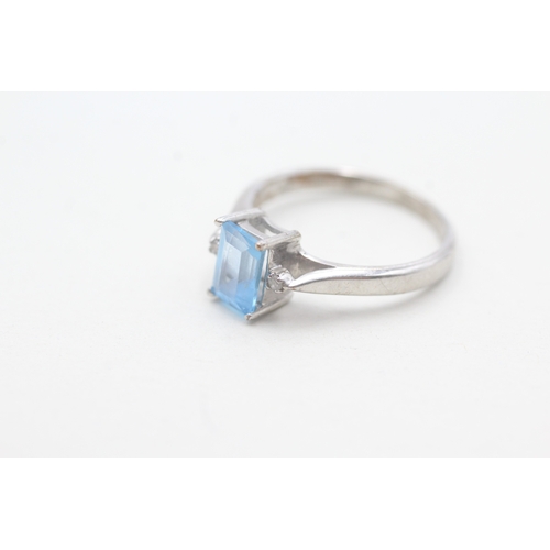 116 - 9ct white gold diamond and blue topaz dress ring (2.5g) Size M 1/2