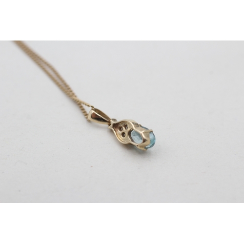 117 - 9ct gold diamond and blue gemstone set pendant necklace (1.7g)