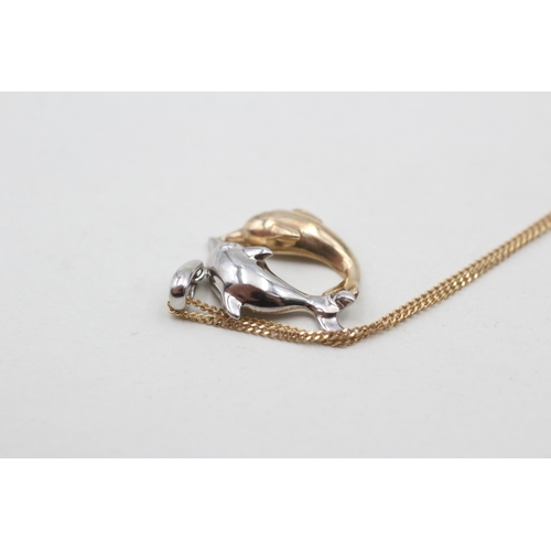 17 - 9ct white and yellow gold diamond set double dolphin pendant necklace (3.6g)