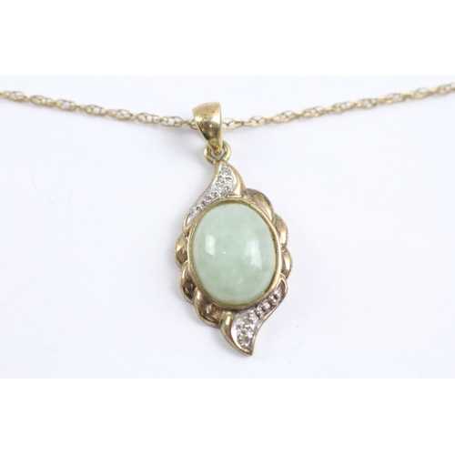 23 - 9ct gold diamond and jade framed pendant on chain (2.7g)