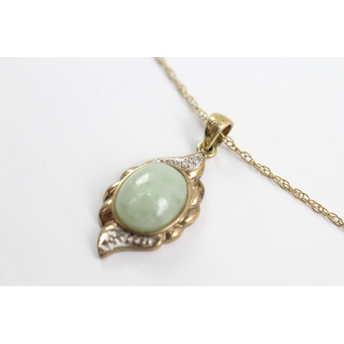 23 - 9ct gold diamond and jade framed pendant on chain (2.7g)