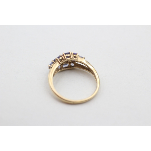 24 - 9ct gold diamond and tanzanite set cluster dress ring (2.6g) Size O 1/2