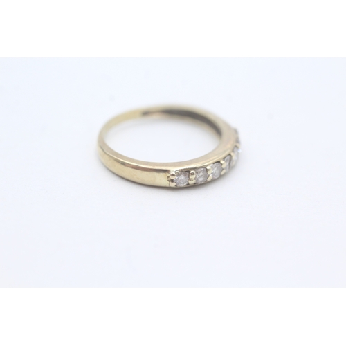 28 - 9ct gold seven stone eternity ring (1.6g) Size K