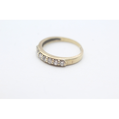 28 - 9ct gold seven stone eternity ring (1.6g) Size K