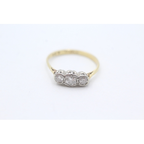 31 - 18ct gold diamond set trilogy ring (1.8g) Size L