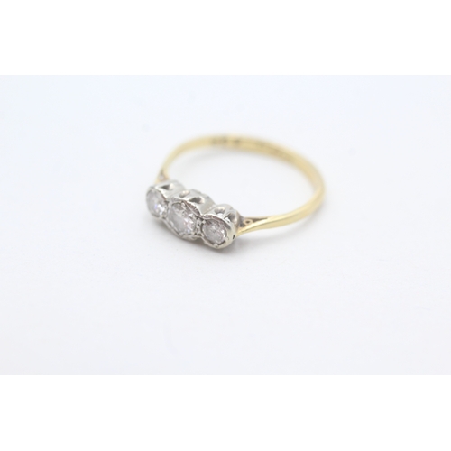 31 - 18ct gold diamond set trilogy ring (1.8g) Size L