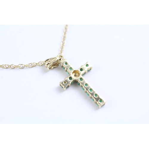 36 - 9ct gold emerald and diamond cross pendant on chain (1.7g)