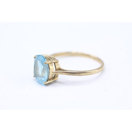 40 - 9ct gold topaz solitaire ring (2.3g) Size R 1/2