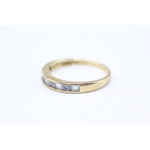 42 - 9ct gold tanzanite and aquamarine channel set ring (1.8g) Size Q