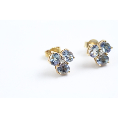 45 - 9ct gold diamond and tanzanite cluster stud earrings (2.2g)