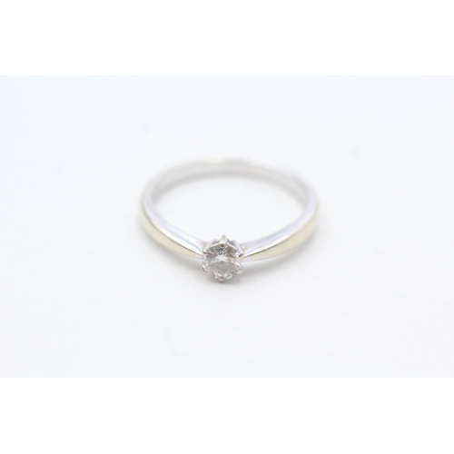 49 - 18ct gold diamond set solitaire ring (2.5g) Size M