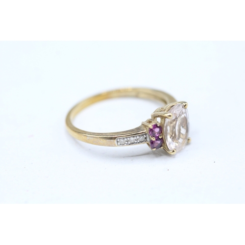 55 - 9ct gold morganite, diamond and garnet set ring (2.6g) Size Q