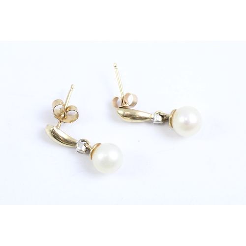 62 - 9ct gold diamond and cultured pearl drop earrings (1.8g)