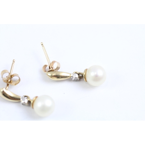 62 - 9ct gold diamond and cultured pearl drop earrings (1.8g)