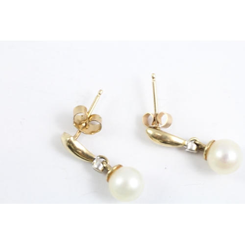 62 - 9ct gold diamond and cultured pearl drop earrings (1.8g)