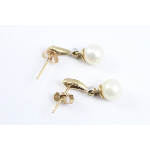 62 - 9ct gold diamond and cultured pearl drop earrings (1.8g)