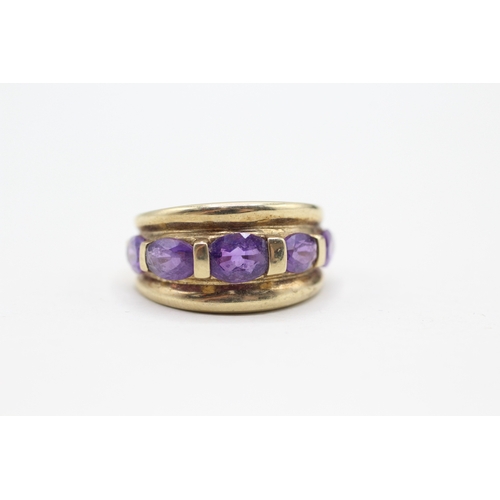 64 - 9ct gold and five stone amethyst ring (3.5g) Size K