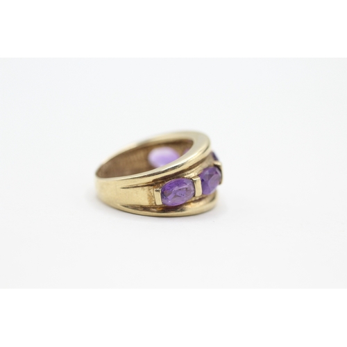 64 - 9ct gold and five stone amethyst ring (3.5g) Size K