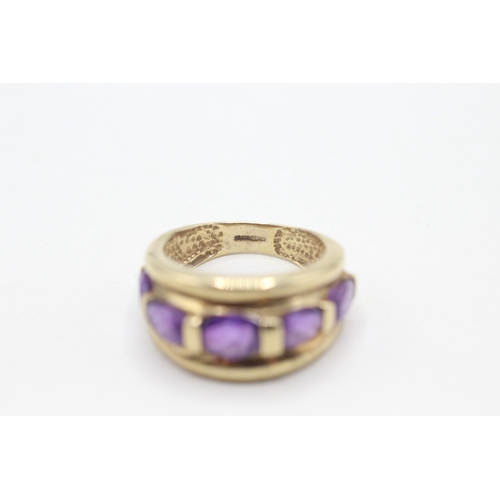 64 - 9ct gold and five stone amethyst ring (3.5g) Size K