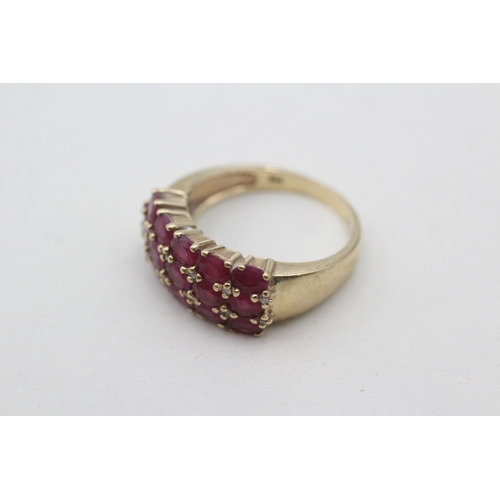 7 - 9ct gold diamond and ruby set band ring (5.3g) Size R