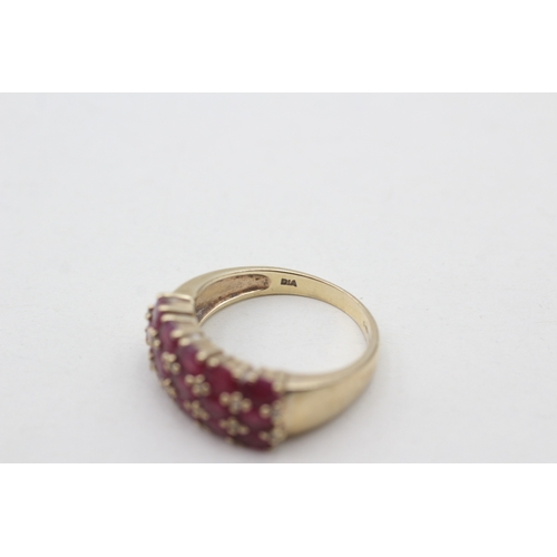 7 - 9ct gold diamond and ruby set band ring (5.3g) Size R